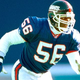 Hall of Fame linebacker Lawrence Taylor takes a hit.